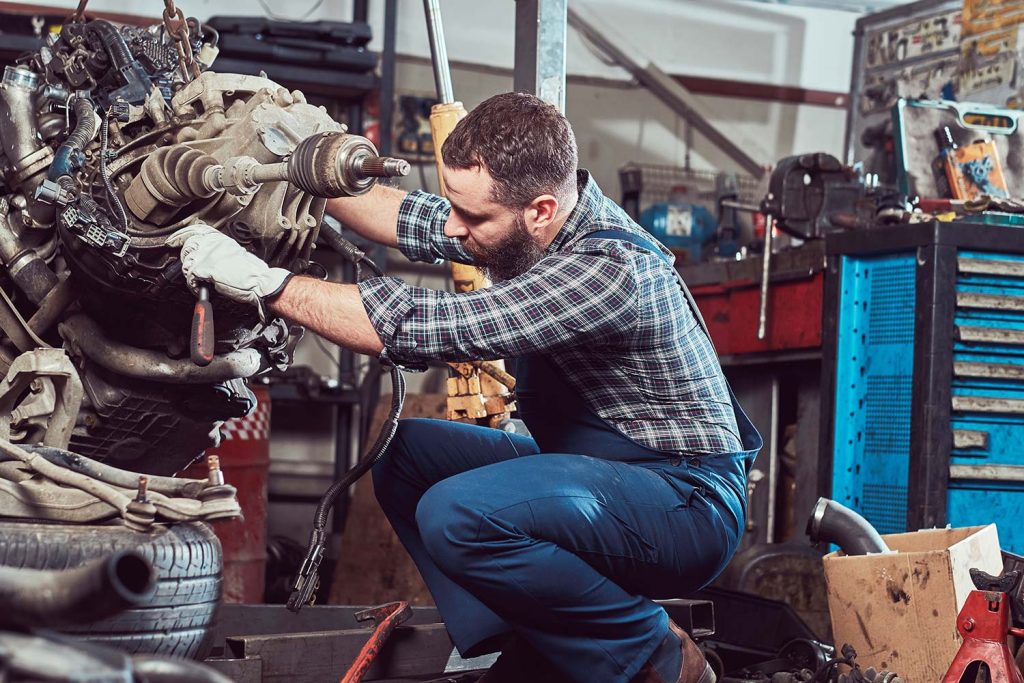 Brutal Tattooed Mechanic Repairs The Car Engine In Small.jpg